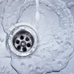 How does bathroom drain buildup form from soaps, Oils, and Hair Products?
