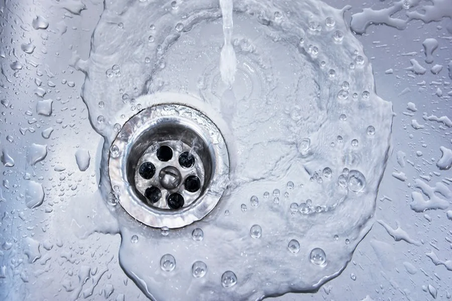 How does bathroom drain buildup form from soaps, Oils, and Hair Products?